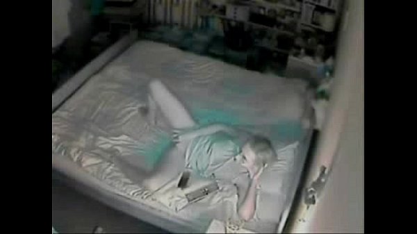 Blonde masturbating on bed caught by hidden cam